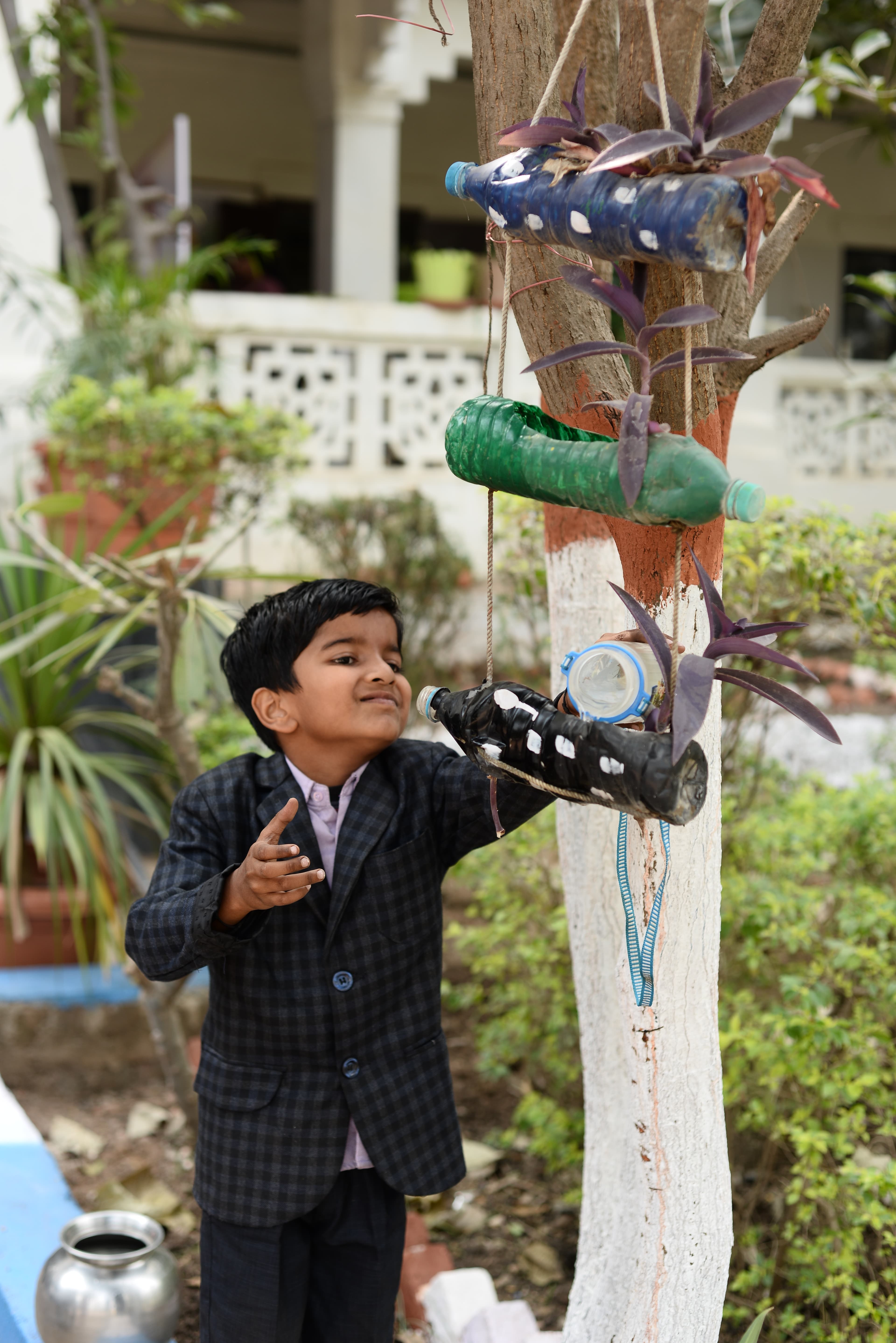 Student holding a flag representing mission